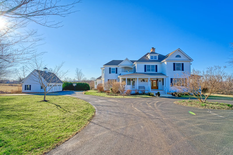 Belmar Farm is a custom home with 8,000 finished square feet sited on 25 acres of land in Middleburg Virginia