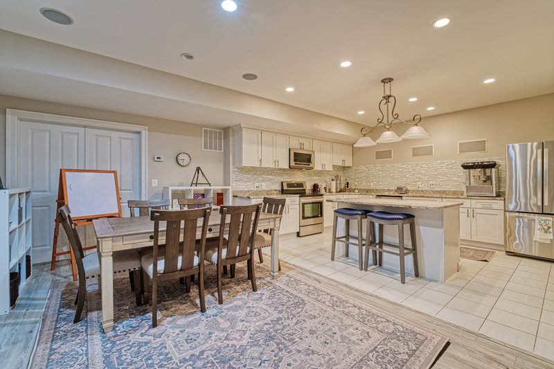 One of the great features of this house is that it has a full second kitchen in the lower level which would be perfect for in-laws or long-term guests